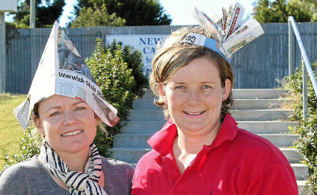 FIELD FASHION: Tina Macdonald and Helen Lewis practise for Fashions in the Field as they strut their stuff down the stairs used for the event.